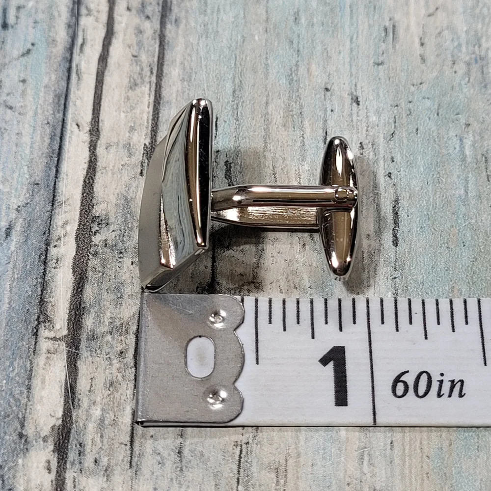 Cuff Links and Tie clip.